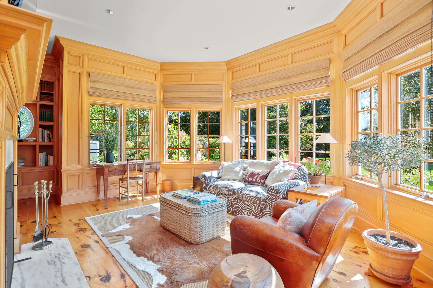 43 Contentment Island Road Darien, CT 06820 - Photo 9 of 59 a living room with furniture and a potted plant