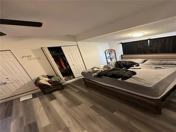 a room with furniture and flat screen tv
