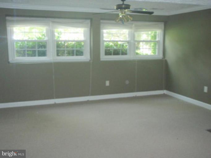 1803 Post Oak Trail Reston, VA 20191 - Photo 9 of 17 an empty room with a window