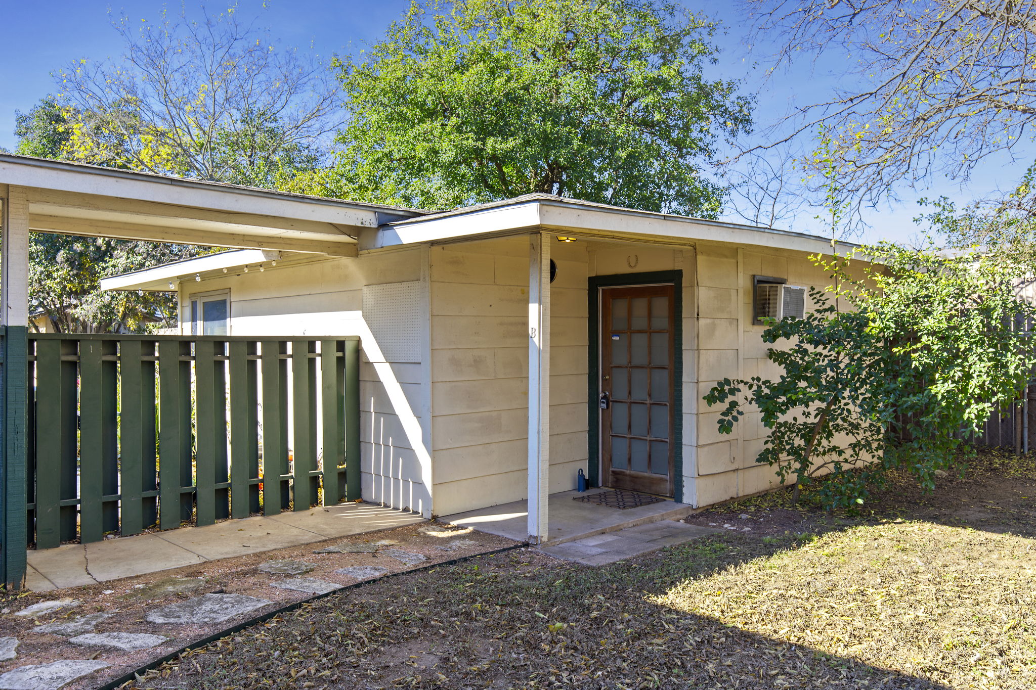 7808 Watson Street, Unit B Austin, TX 78757 - Photo 1 of 12 a view of a garage