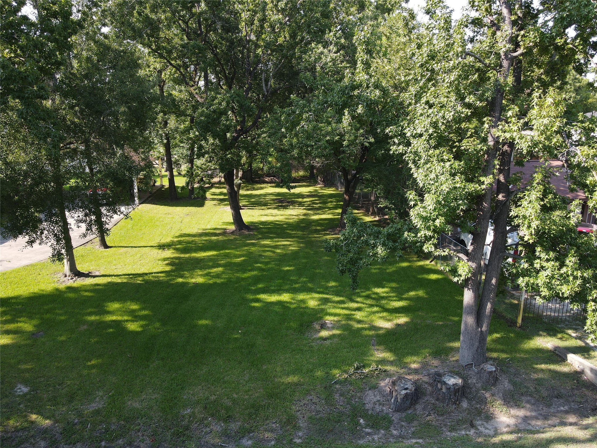 0 Caddo Road Houston, TX 77078 - Photo 5 of 6 a swimming pool with outdoor seating and yard