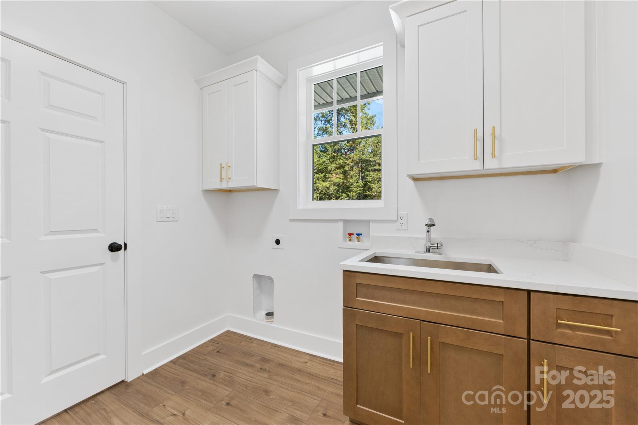 1871 Lynmore Drive Sherrills Ford, NC 28673 - Photo 15 of 40 a kitchen with a sink and cabinets
