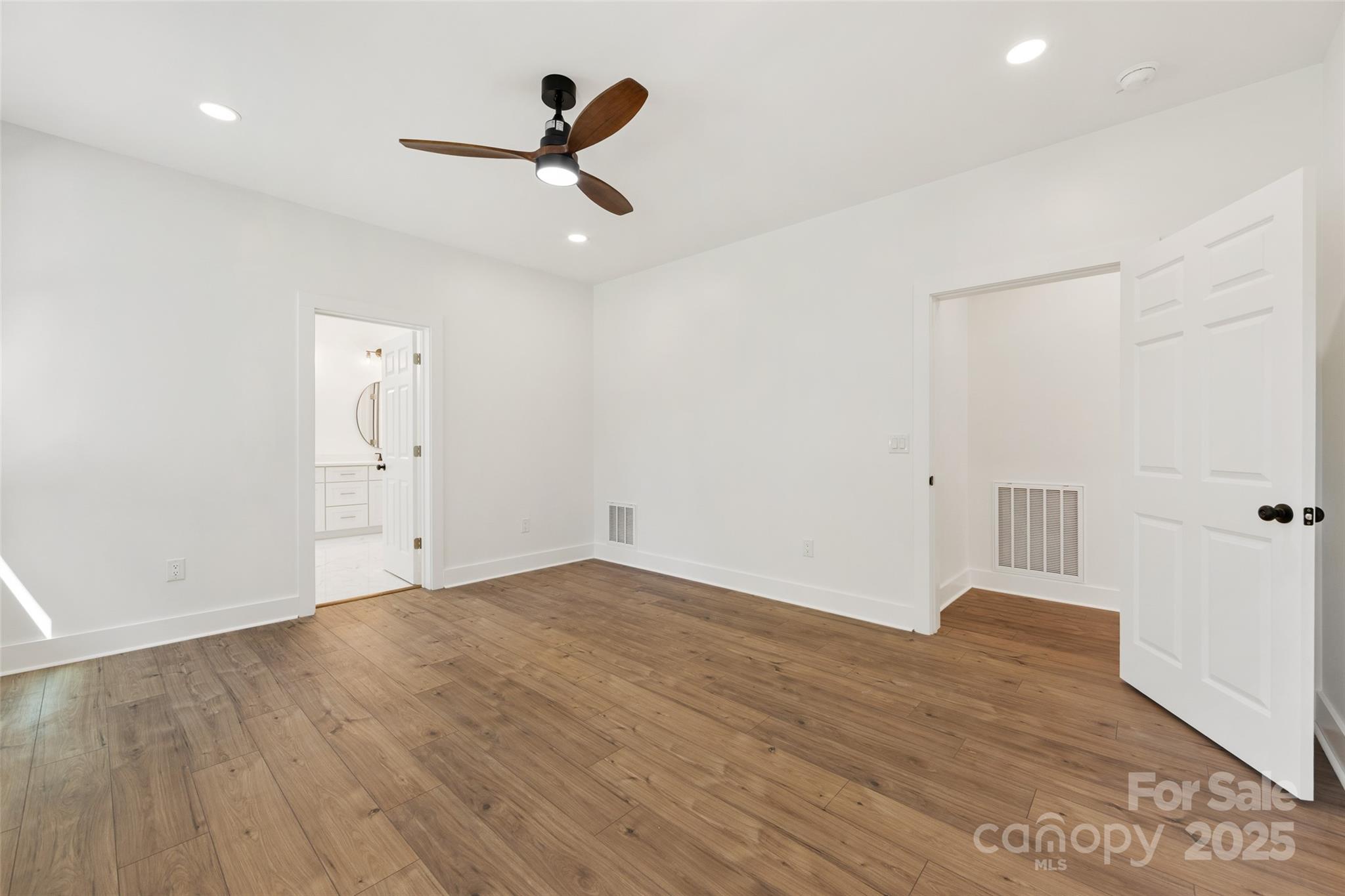1871 Lynmore Drive Sherrills Ford, NC 28673 - Photo 25 of 40 wooden floor in an empty room with a window