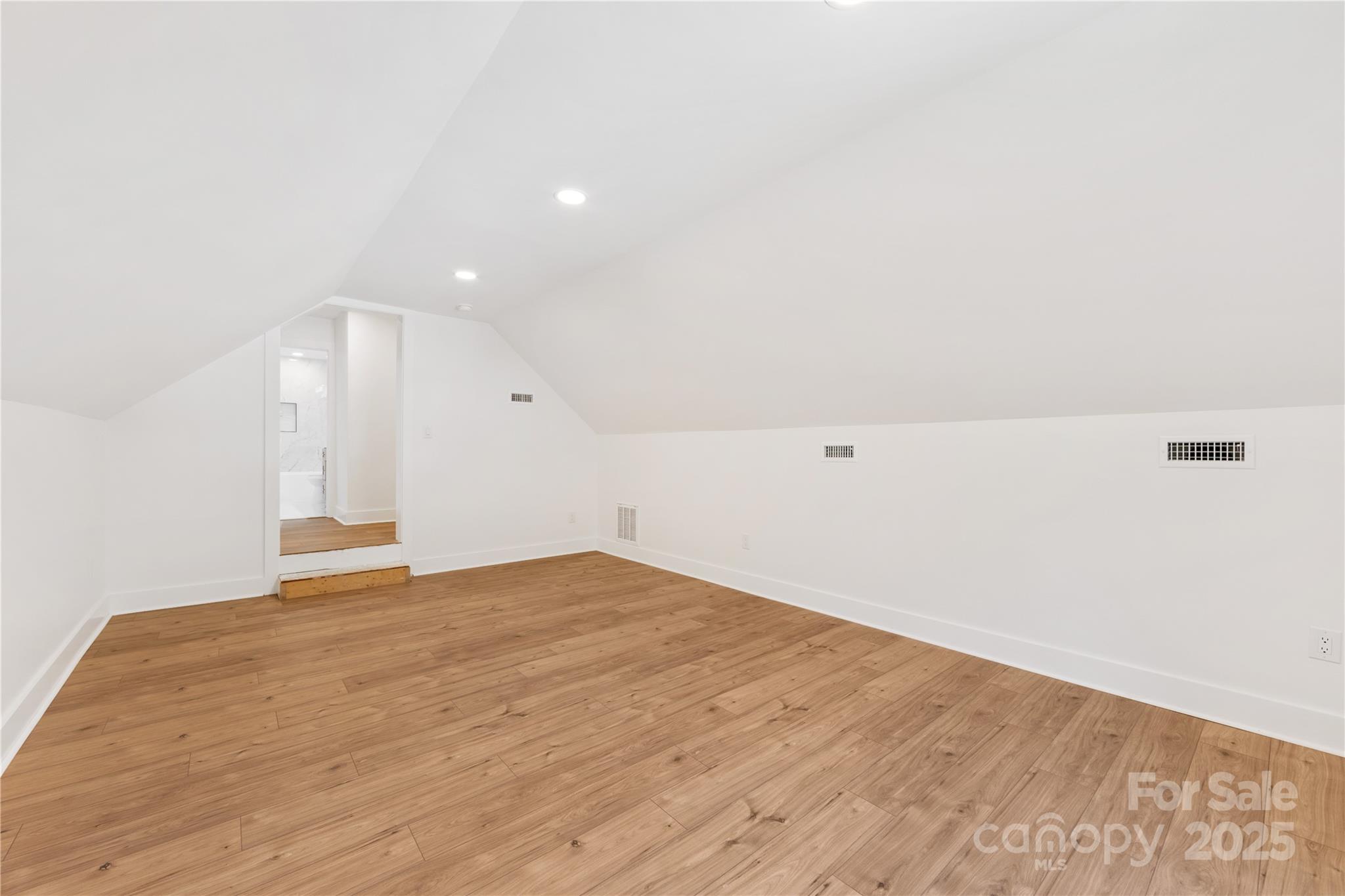 1871 Lynmore Drive Sherrills Ford, NC 28673 - Photo 27 of 40 a view of empty room with wooden floor
