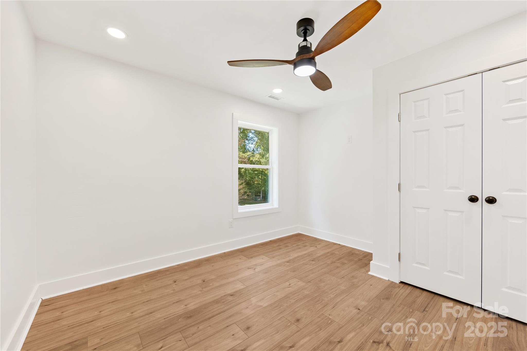 1871 Lynmore Drive Sherrills Ford, NC 28673 - Photo 28 of 40 wooden floor in an empty room with a window