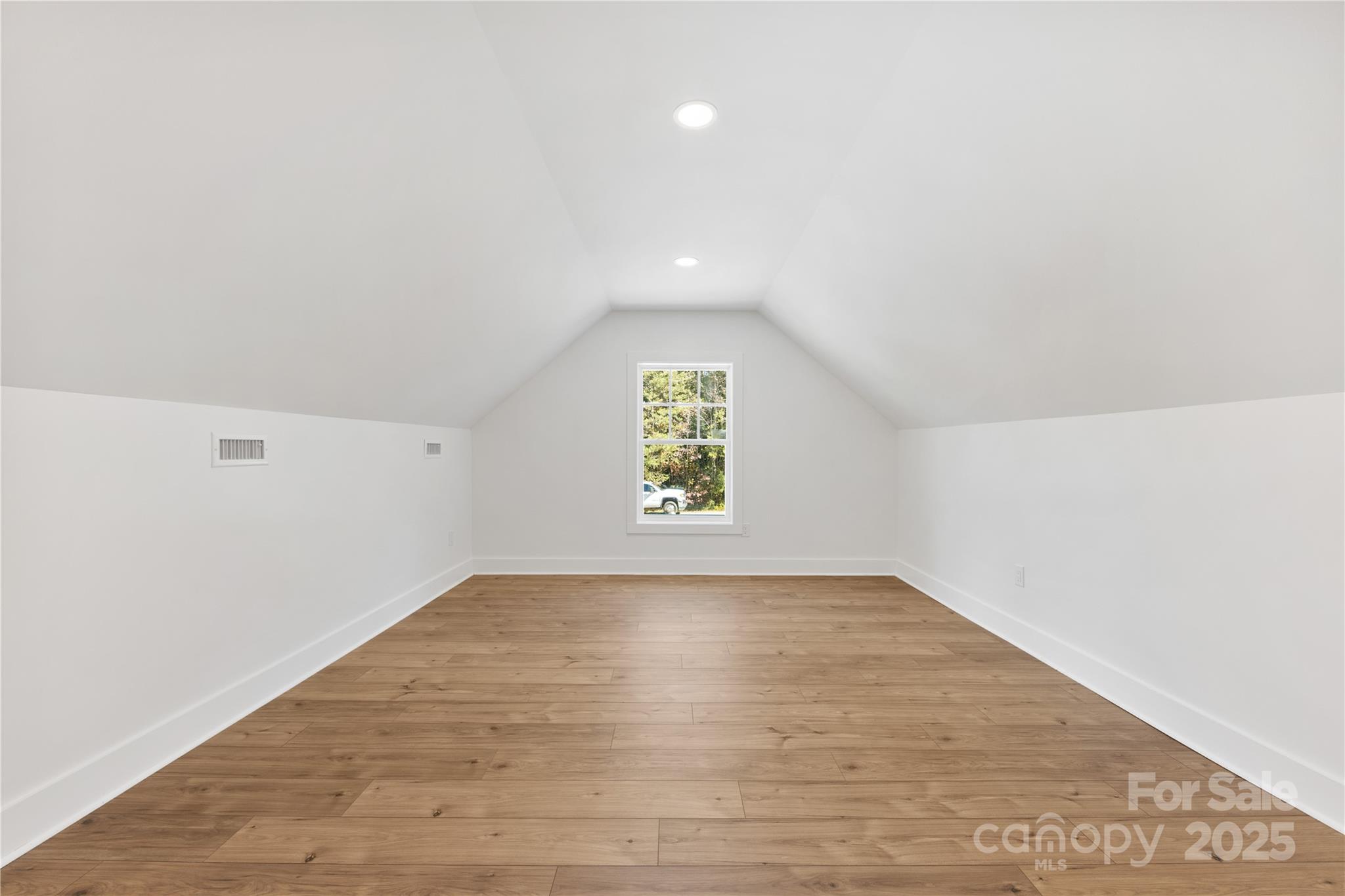1871 Lynmore Drive Sherrills Ford, NC 28673 - Photo 35 of 40 an empty room with wooden floor and windows