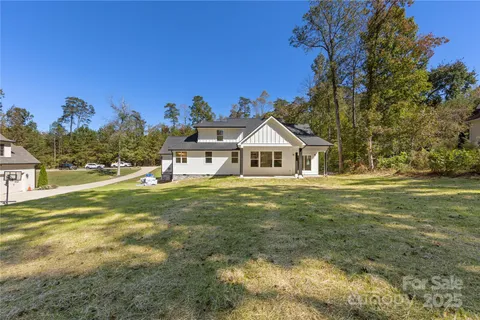 a front view of house with garden