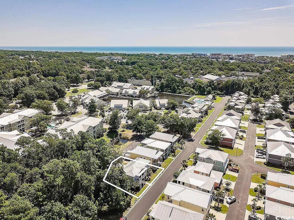 399 Lumbee Circle Pawleys Island, SC 29585 - Photo 28 of 30 Aerial perspective of suburban area featuring a large body of water