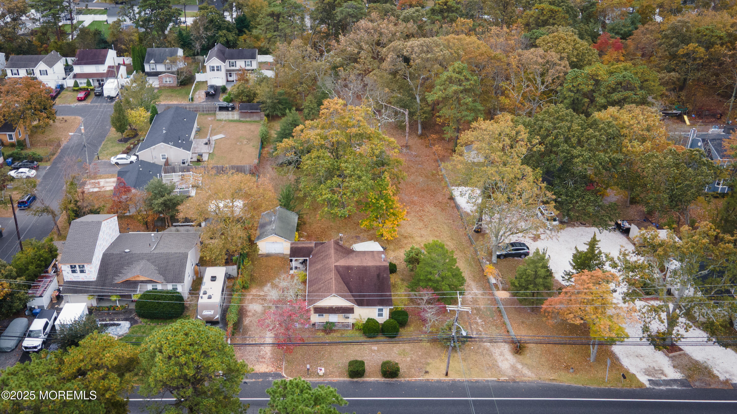 219 Kettle Creek Road Toms River, NJ 08753 - Photo 5 of 26 an aerial view of residential houses with outdoor space