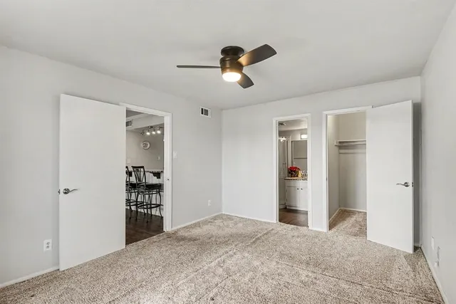 a view of a balcony with chairs