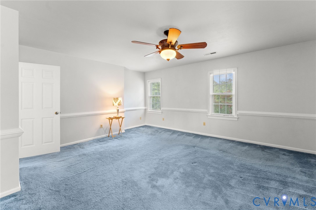 1760 Gloucester Road Gloucester Point, VA 23062 - Photo 41 of 47 Spacious room featuring light blue carpeting, whit