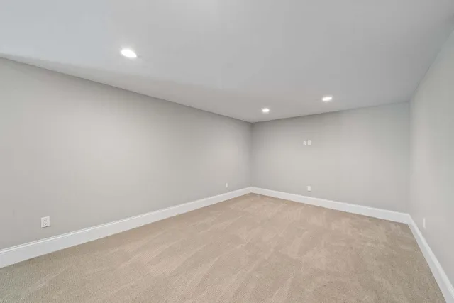 a view of a terrace with furniture and a yard