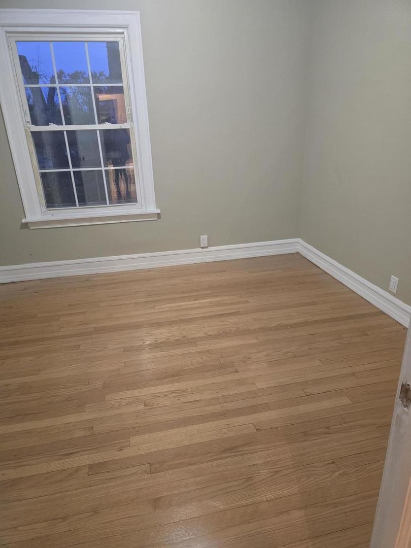 9632 South Charles Street, Unit 2R Chicago, IL 60643 - Photo 4 of 4 a view of an empty room with a window