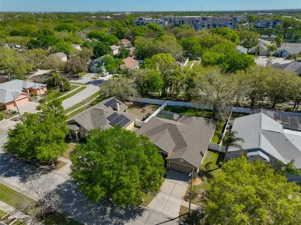 an aerial view of a house with a garden