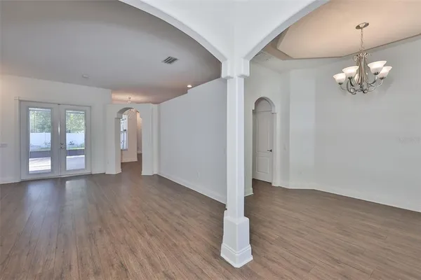 a view of a livingroom with wooden floor