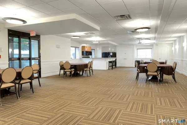 a view of a dining room with furniture