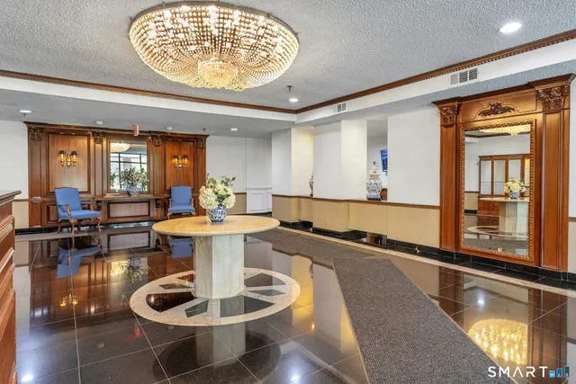 a very nice looking dining room with a table and chairs