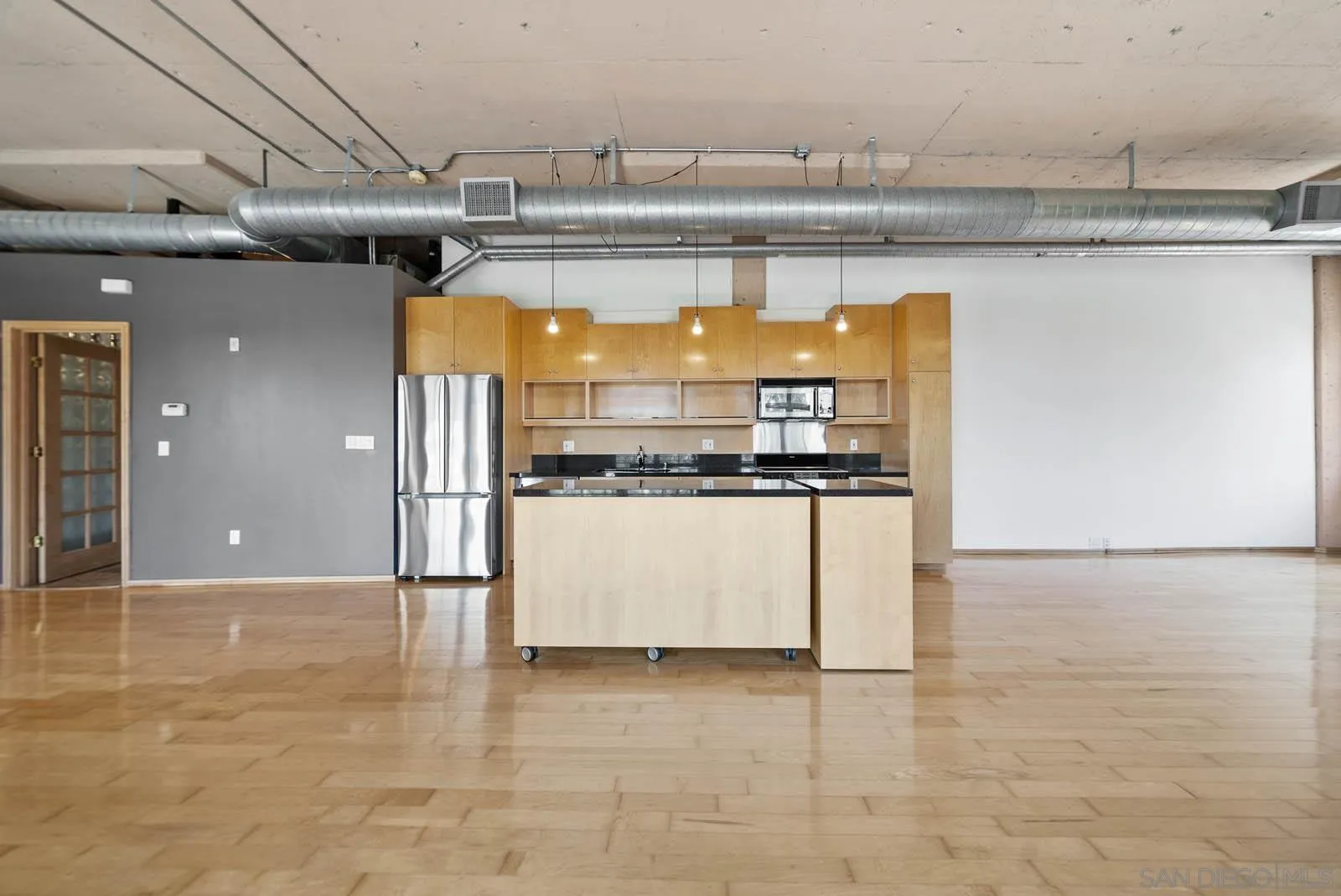 3940 7th Avenue, Unit 206 San Diego, CA 92103 - Photo 21 of 54 a view of kitchen with stainless steel appliances granite countertop a stove and a refrigerator