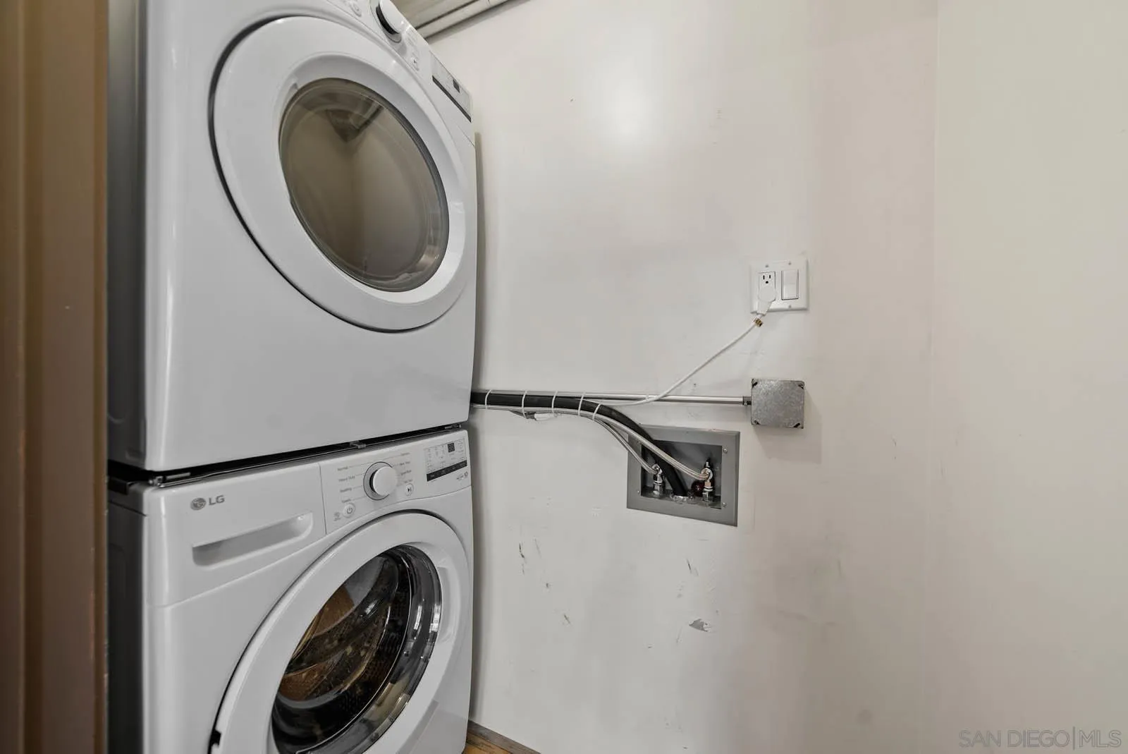 3940 7th Avenue, Unit 206 San Diego, CA 92103 - Photo 31 of 54 a utility room with dryer and washer