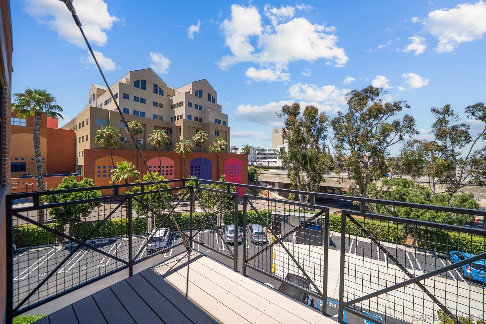 3940 7th Avenue, Unit 206 San Diego, CA 92103 - Photo 33 of 54 a view of a chairs and table in the balcony