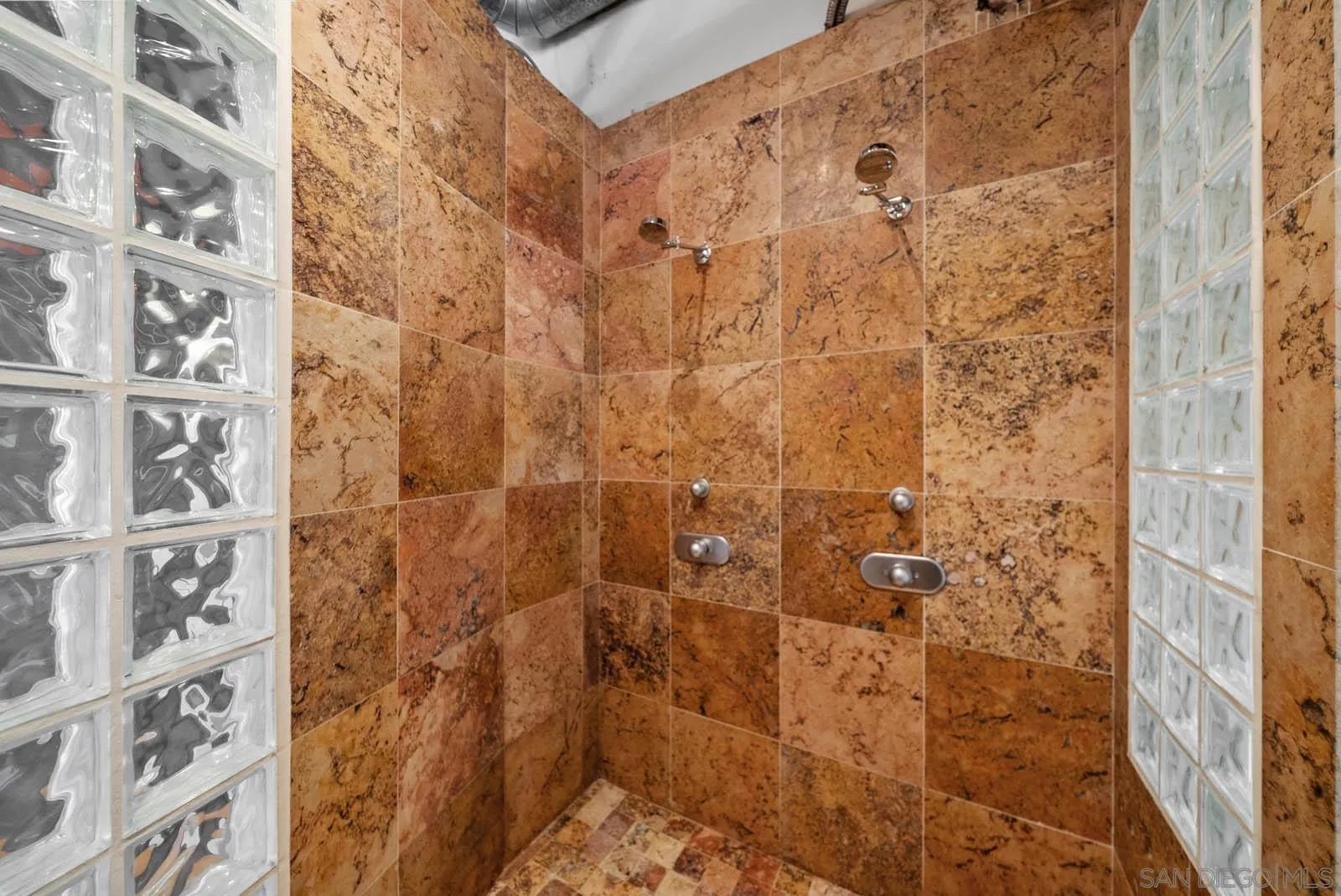 3940 7th Avenue, Unit 206 San Diego, CA 92103 - Photo 48 of 54 a bathroom with a shower