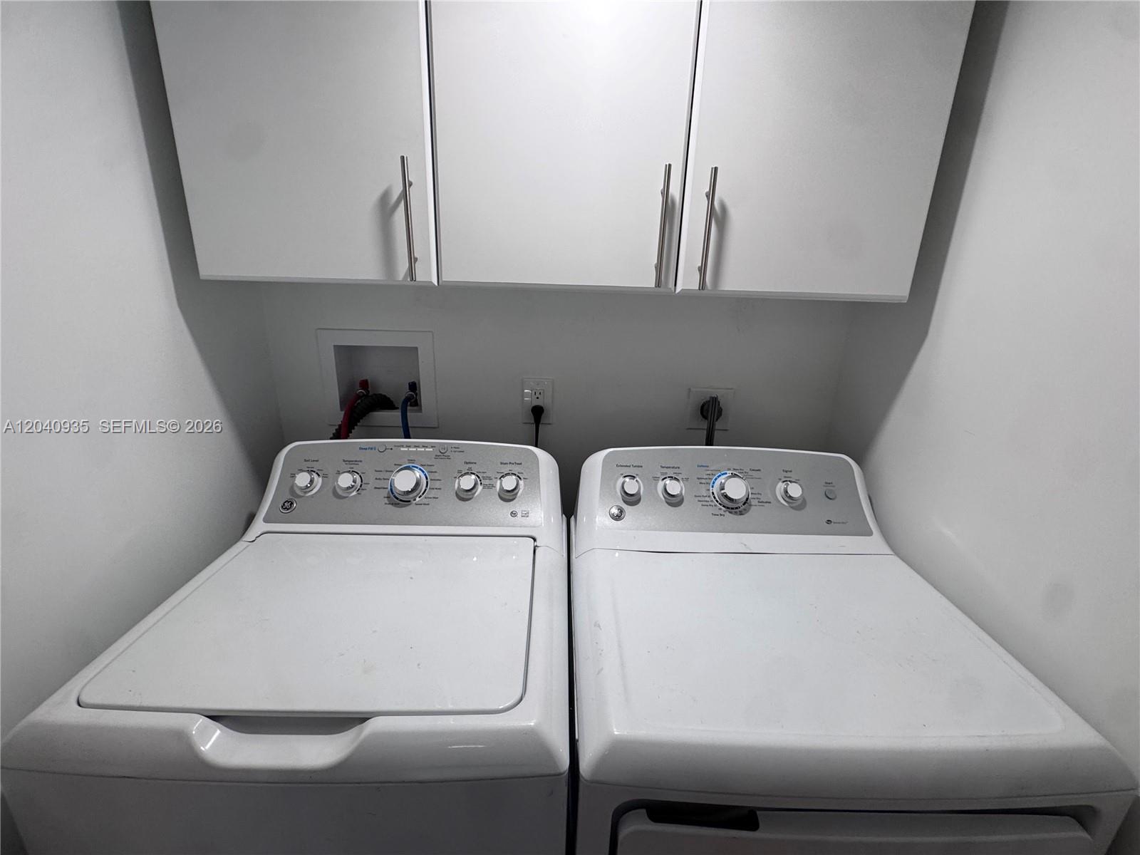 375 Southwest 32nd Road Miami, FL 33129 - Photo 40 of 44 a utility room with dryer and washer