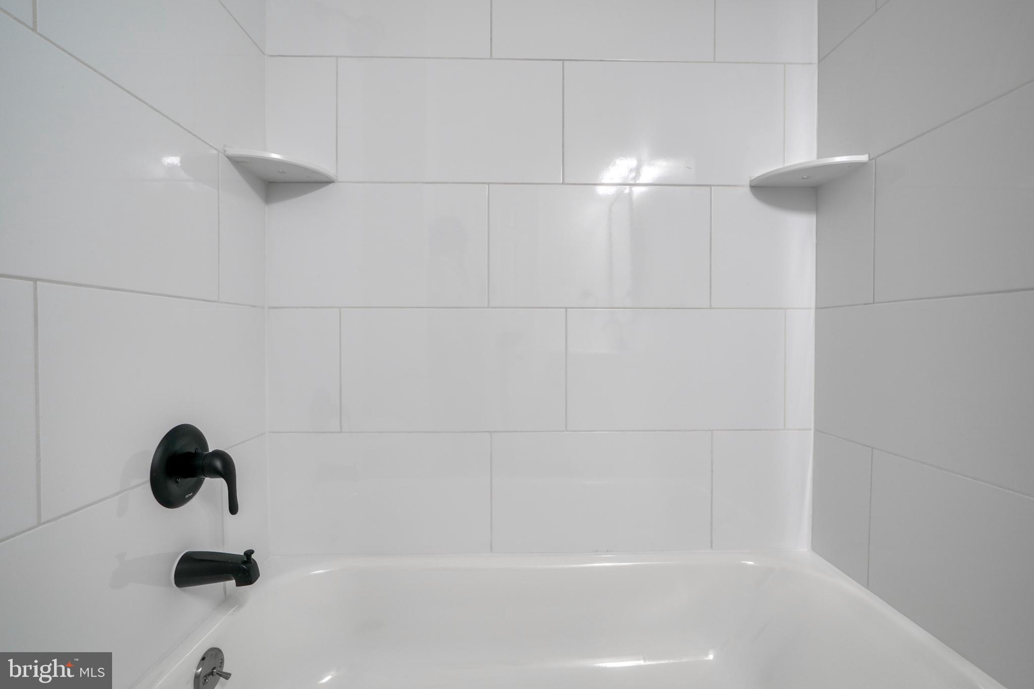 7233 Brookfalls Terrace Baltimore, MD 21209 - Photo 20 of 26 a close up of a bathtub