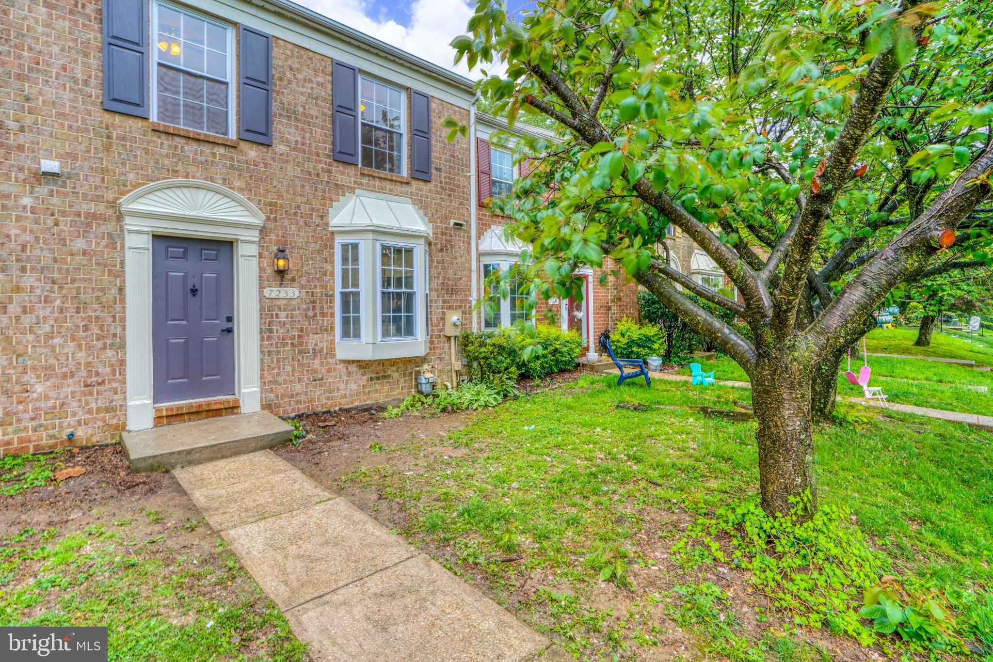 7233 Brookfalls Terrace Baltimore, MD 21209 - Photo 24 of 26 a front view of a house with garden