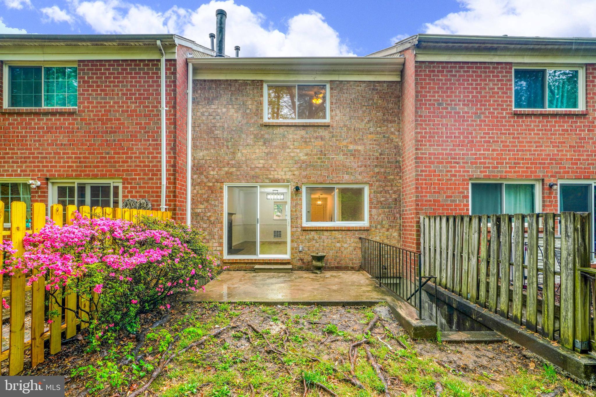 7233 Brookfalls Terrace Baltimore, MD 21209 - Photo 26 of 26 a front view of a house with a yard