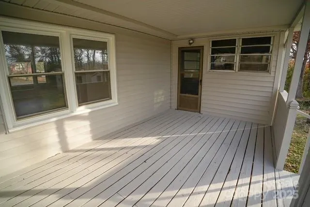 a view of a house with a large window