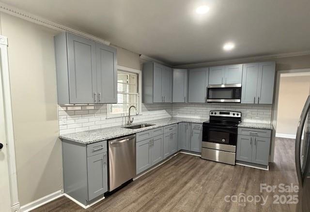 116 Brymer Road Gastonia, NC 28056 - Photo 10 of 21 a kitchen with granite countertop stainless steel appliances and wooden cabinets