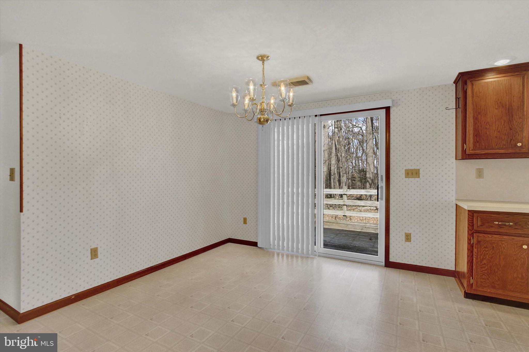 3550 Hampstead Mexico Road Hampstead, MD 21074 - Photo 14 of 34 Dining area with slider to rear deck