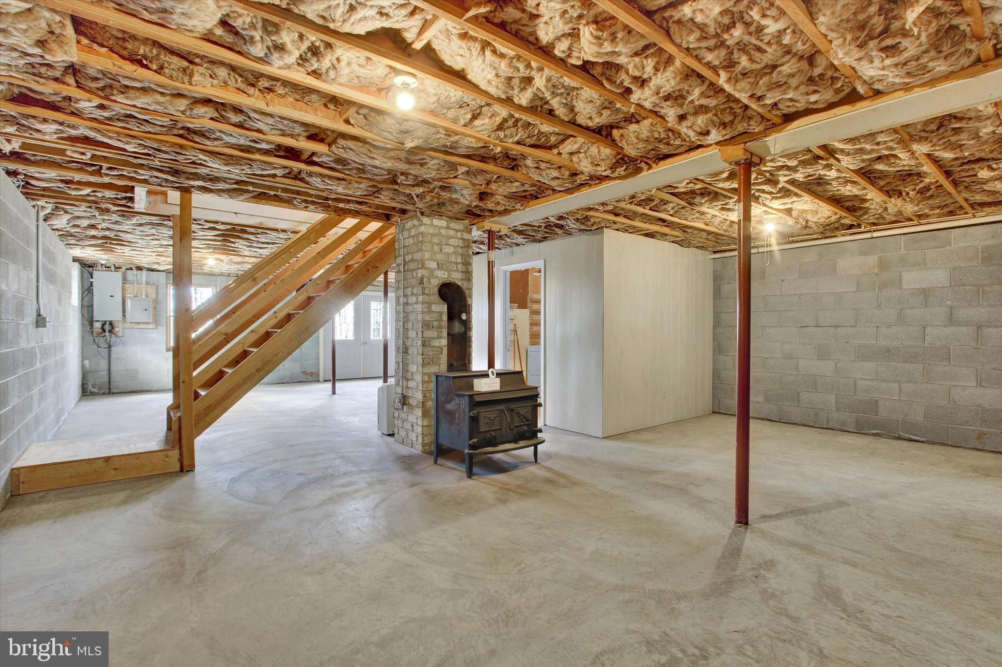 3550 Hampstead Mexico Road Hampstead, MD 21074 - Photo 25 of 34 Lower level with woodstove