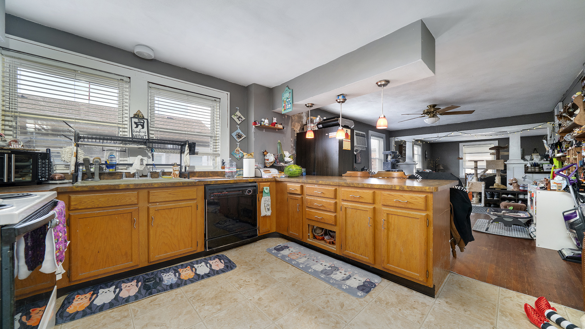128 West 2nd Street Byron, IL 61010 - Photo 15 of 48 a kitchen with cabinets a sink and appliances