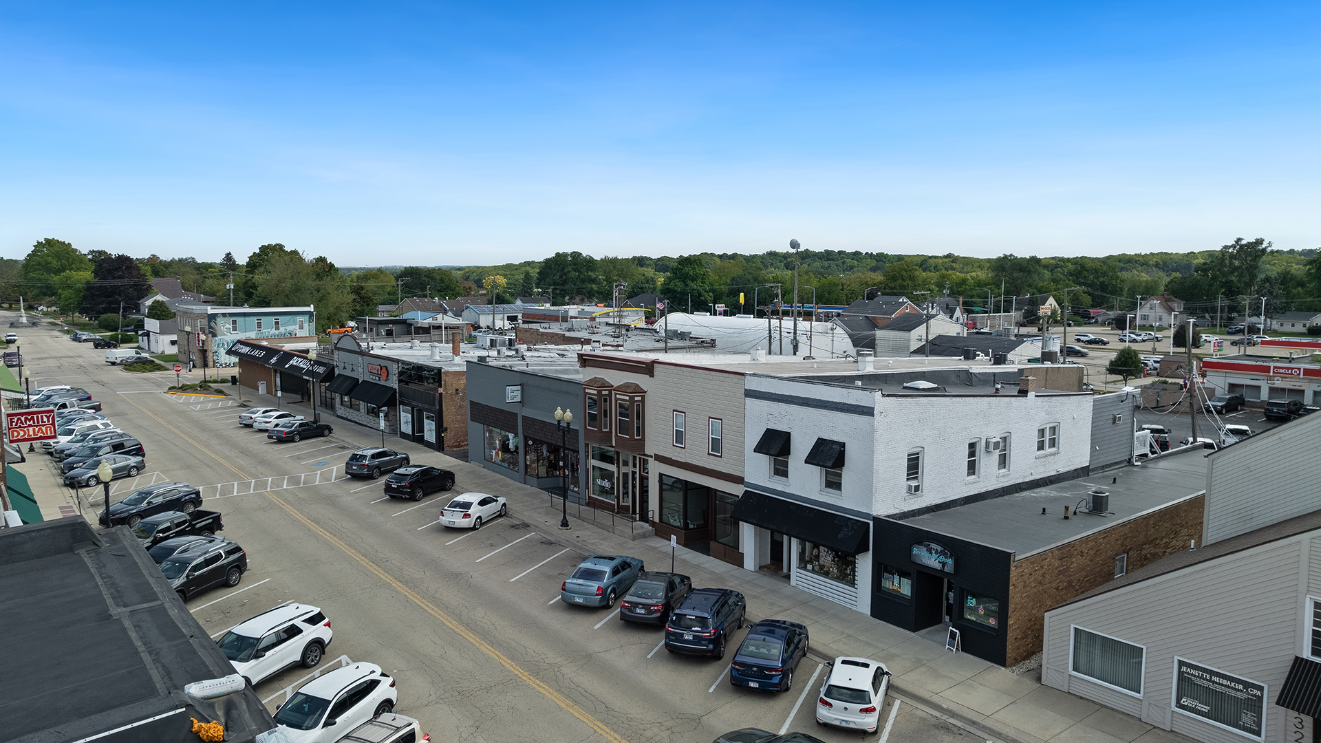 128 West 2nd Street Byron, IL 61010 - Photo 2 of 48 a view of a city with furniture
