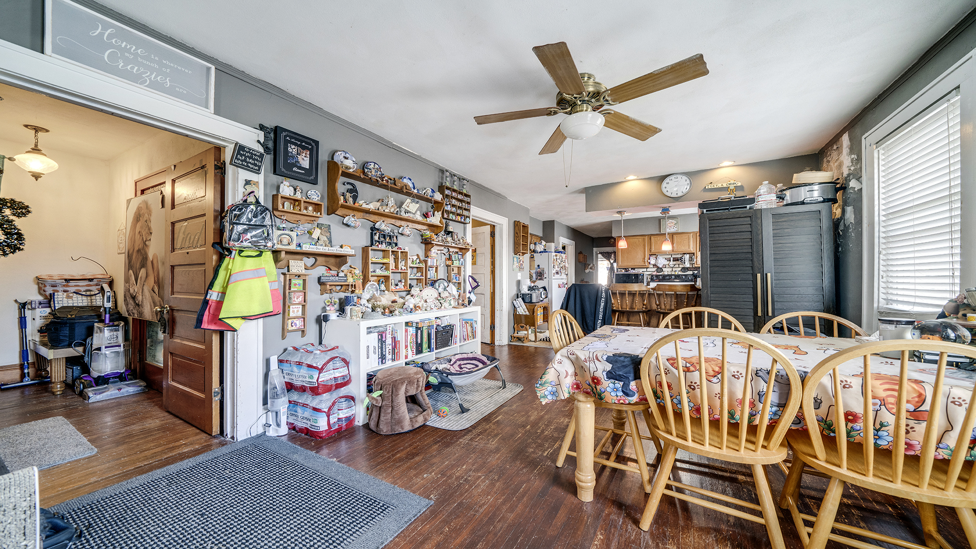 128 West 2nd Street Byron, IL 61010 - Photo 21 of 48 a view of a livingroom with furniture and a ceiling fan