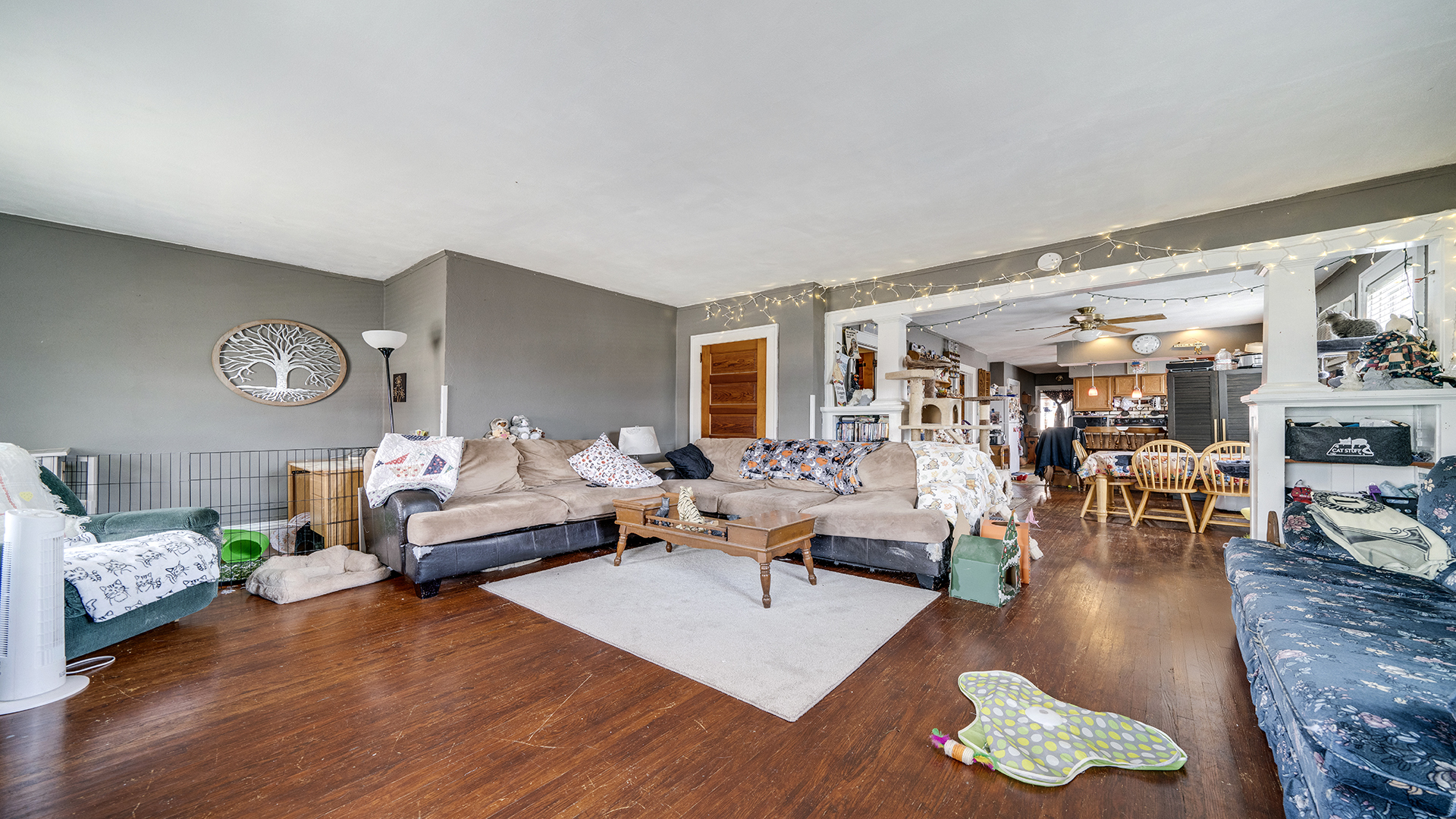 128 West 2nd Street Byron, IL 61010 - Photo 22 of 48 a living room with furniture and a wooden floor