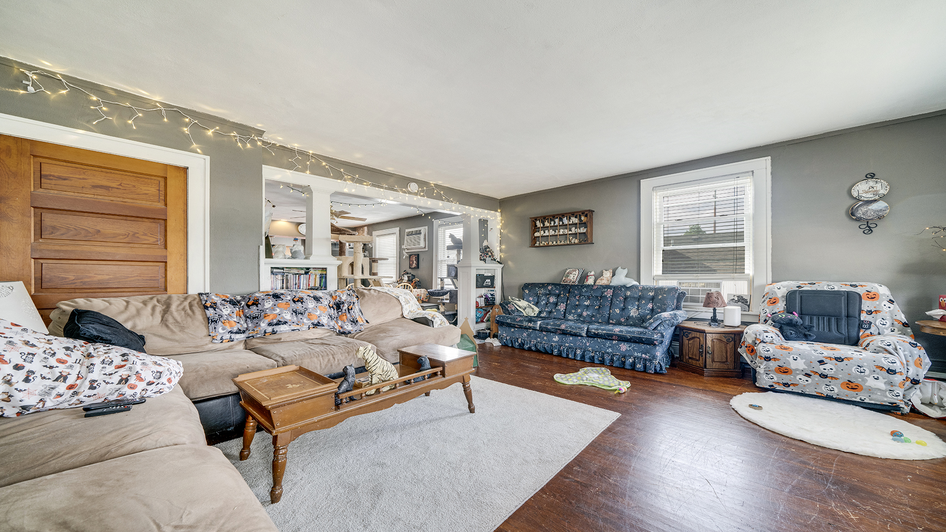 128 West 2nd Street Byron, IL 61010 - Photo 23 of 48 a living room with furniture and a large window