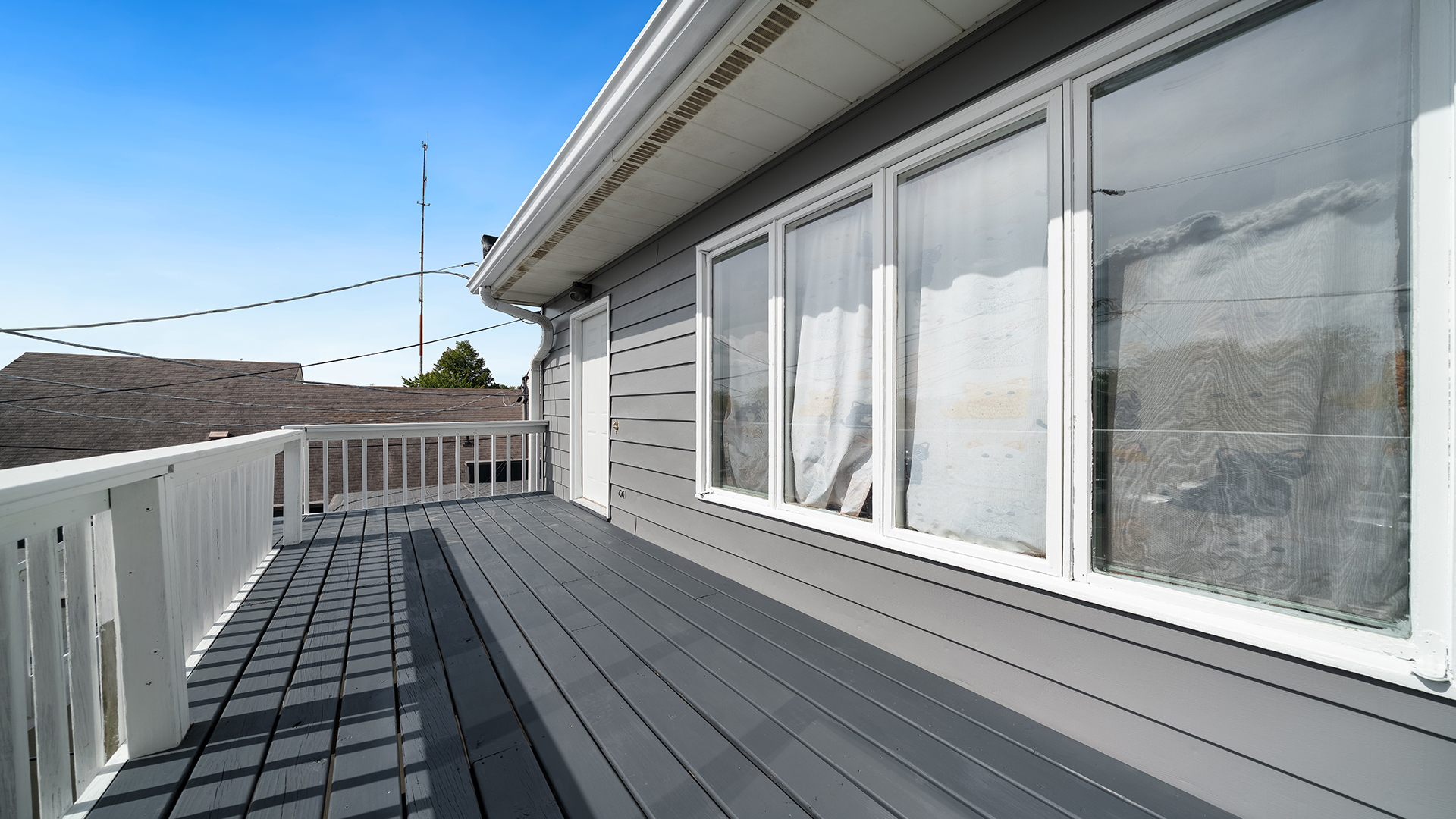 128 West 2nd Street Byron, IL 61010 - Photo 26 of 48 a view of balcony with wooden floor