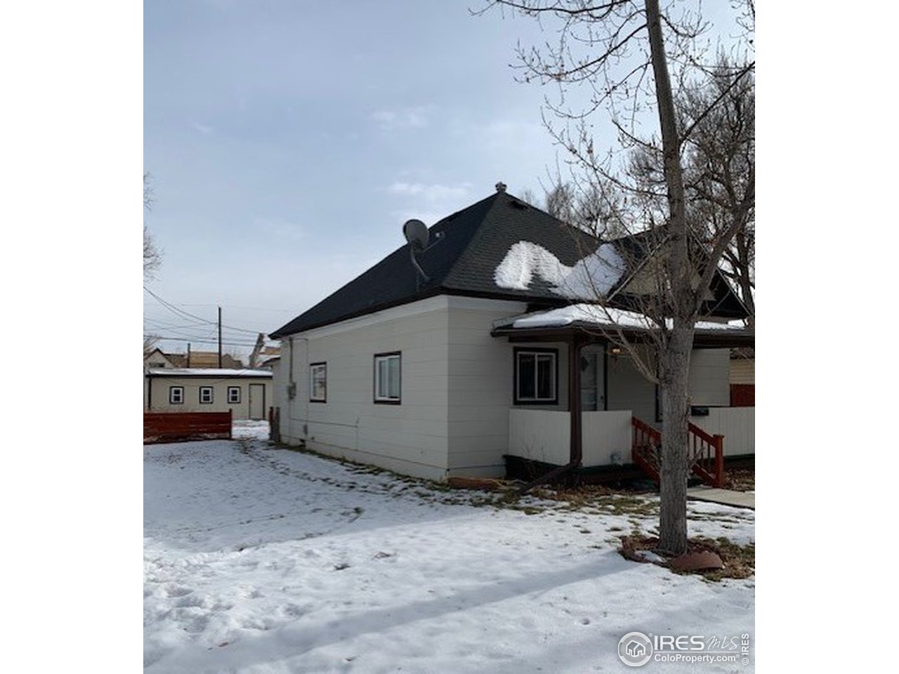 316 Walnut Street Fort Morgan, CO 80701 - Photo 17 of 22 a view of a house with a yard