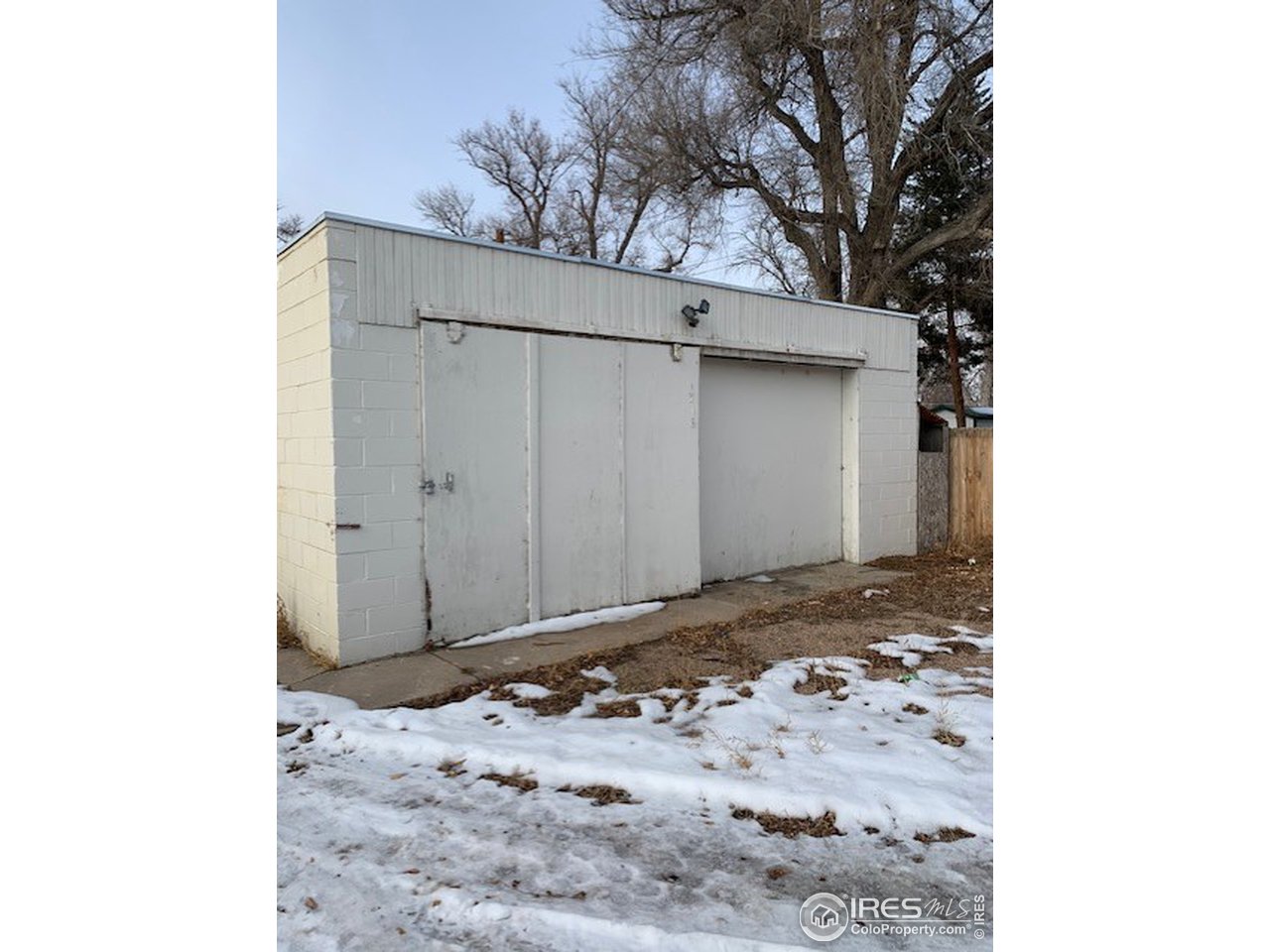 316 Walnut Street Fort Morgan, CO 80701 - Photo 19 of 22 a view of a backyard of the house