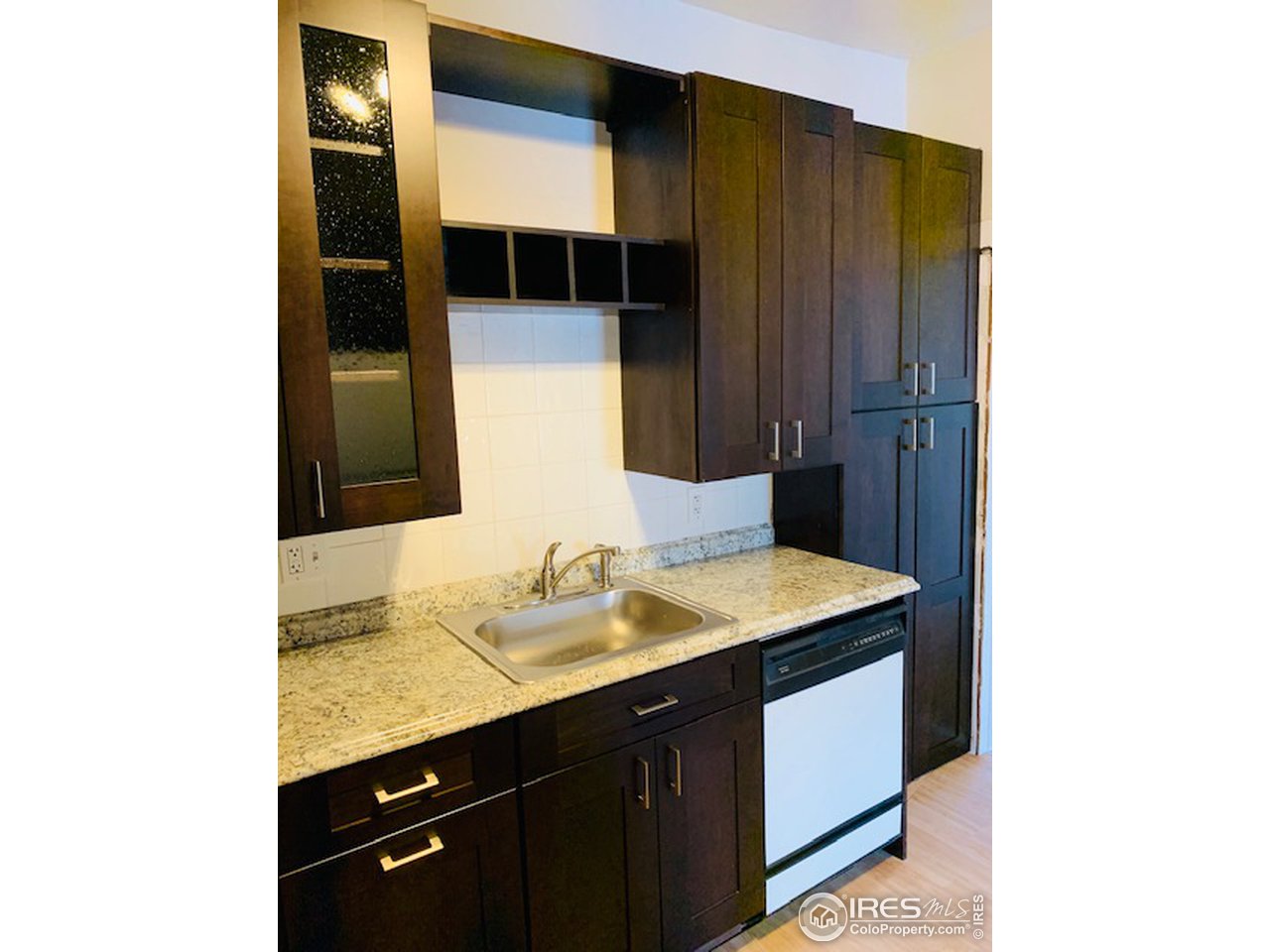 316 Walnut Street Fort Morgan, CO 80701 - Photo 6 of 22 a bathroom with a sink and a mirror
