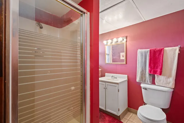 a bathroom with a toilet a sink and bath tub