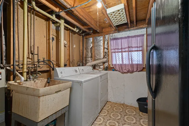 a bathroom with a sink and mirror