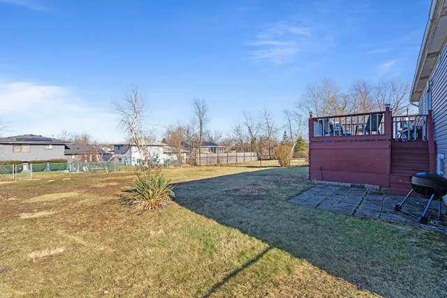 a view of a yard with an trees