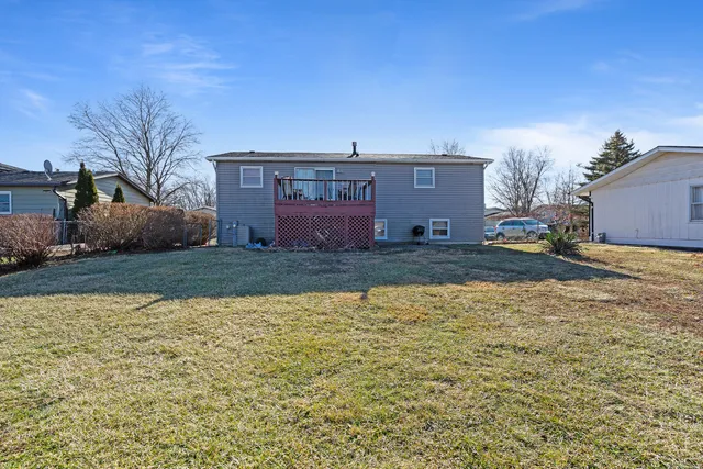 a view of yard with swimming pool and mountain view