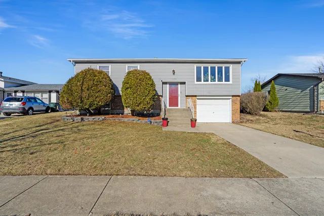 a view of a backyard of the house