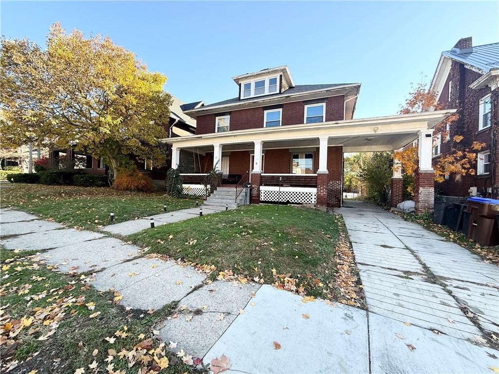 92 Euclid Avenue Sharon, PA 16146 - Photo 1 of 17 front view of a house with a yard