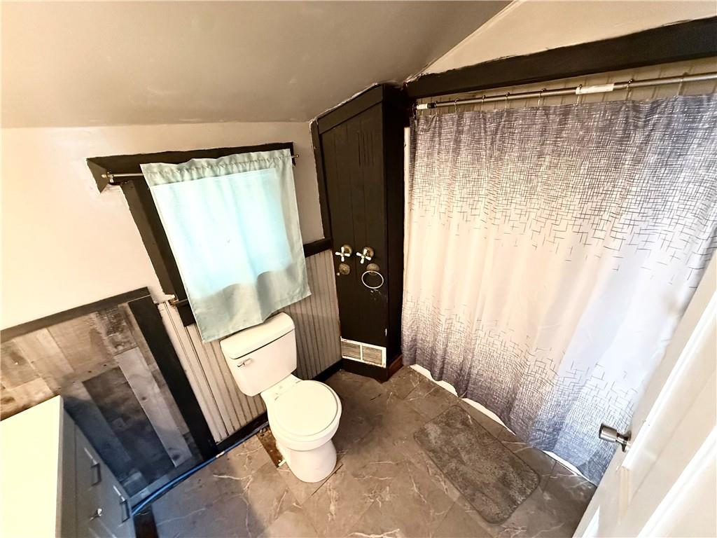 92 Euclid Avenue Sharon, PA 16146 - Photo 13 of 17 a bathroom with a toilet a sink and shower