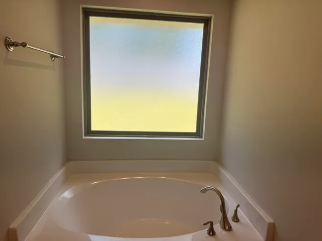 a bathroom with a bathtub